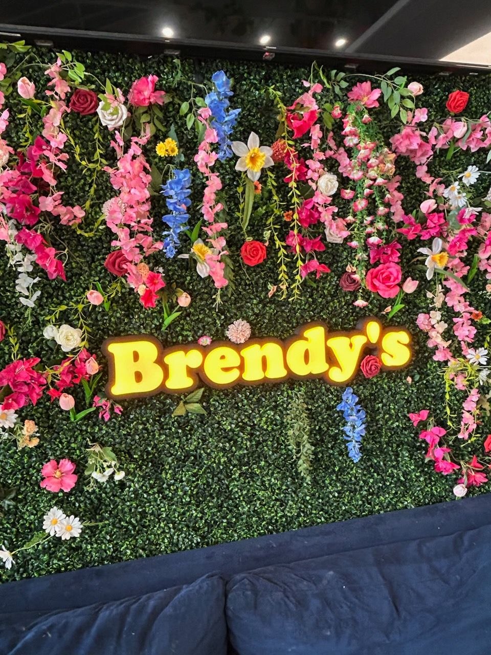 Brendy's LED sign, close-up on the flower wall